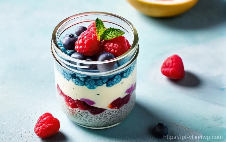 뱃살 감소를 도와주는 건강 디저트 - **Prompt:** A close-up, high-angle shot of a beautifully layered chia seed pudding in a clear glass ...