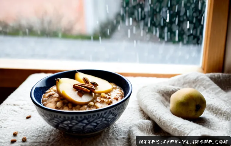 Home 17 겨울철 따뜻하게 즐기는 건강 디저트 - Photorealistic cozy winter breakfast scene in a Portuguese home, a rustic ceramic bowl of warm cinna...